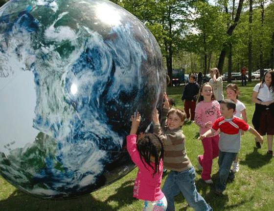 Image result for kids pushing a giant Earth ball